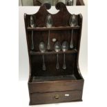 An 18th Century oak spoon rack,