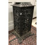 An early 20th Century cast iron greenhouse / conservatory heater with urn and scrolling foliate