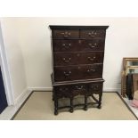 An 18th Century oak chest on chest,