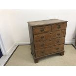 A 19th Century oak chest, the two plank top with applied moulded edge,