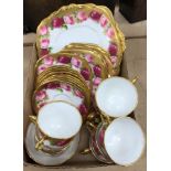 A Royal Albert Crown China Old English Rose pattern part tea set comprising eight cups and saucers,