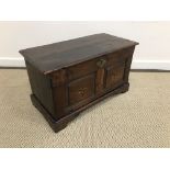 An 18th Century oak miniature coffer,