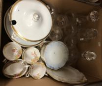 A box containing a Royal Albert part floral decorated tea service, various glass plates,
