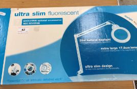 A boxed Ultra Slim fluorescent magnifying daylight lamp