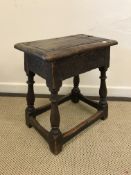 A 17th Century joined oak stool,