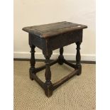 A 17th Century joined oak stool,