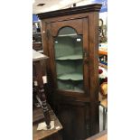 A 19th Century oak free-standing corner cupboard,