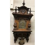 A Victorian walnut cased Vienna style regulator,