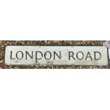 A painted metal street sign inscribed "London Road" 109 cm x 23 cm