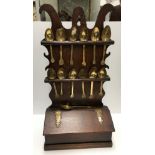 An 18th Century oak spoon rack,