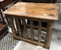 A 17th Century walnut table, the single piece top with moulded edge,