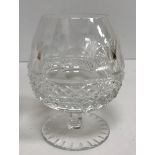 A collection of Waterford and other cut glass glassware to include wine glasses, brandy balloons,