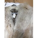 A collection of furs to include a mink jacket with three quarter length sleeves and satin lining,