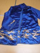 A set of vintage Chinese silk pyjamas in blue and gold, comprising trousers and tank top,