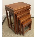 A modern Chinese nest of four hardwood tables, 50.5 cm wide x 35.