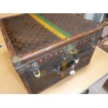 A vintage Louis Vuitton square hard cased travel case with painted yellow and green stripes and