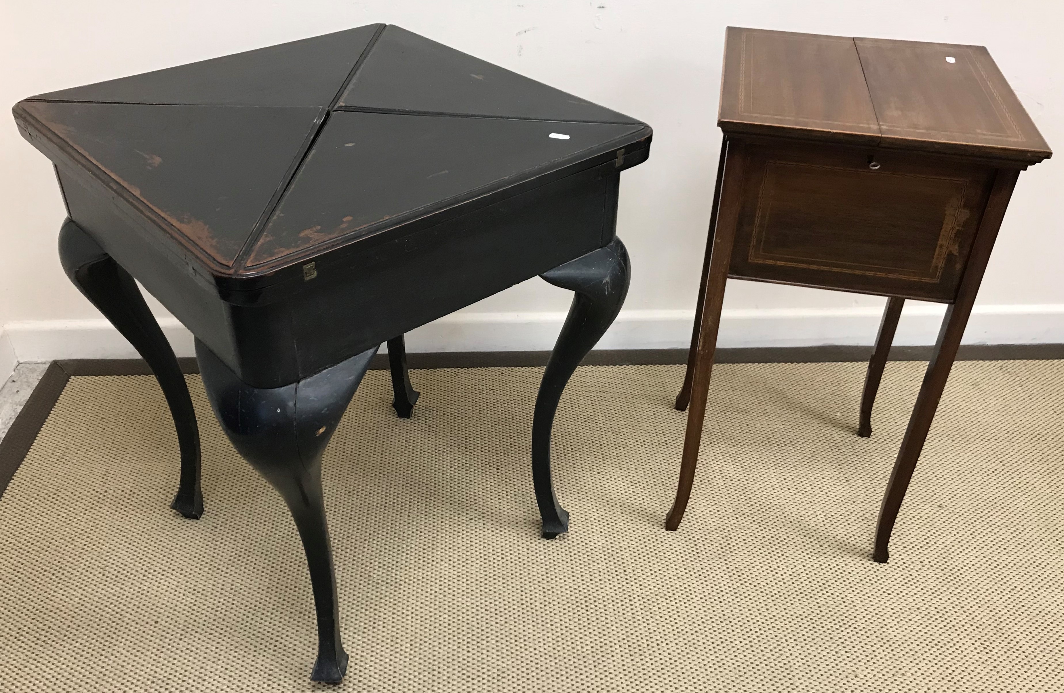 An Edwardian ebonised envelope card table,