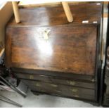 An 18th Century oak bureau,