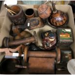 A box containing a collection of various treen ware including two Continental carved and painted