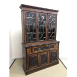 A Victorian walnut bookcase cabinet,