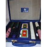 A Crockfords blue leather cased gaming token set with associated part cards