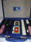 A Crockfords blue leather cased gaming token set with associated part cards