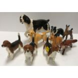 A collection of nine various Beswick figures including pointer 17 cm long x 12.