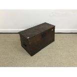 An 18th Century oak trunk of tapered form,