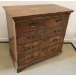 An 18th Century walnut chest,