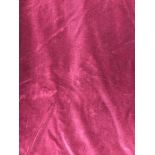 A pair of plum velvet curtains, lined, with a taped pencil pleat heading,