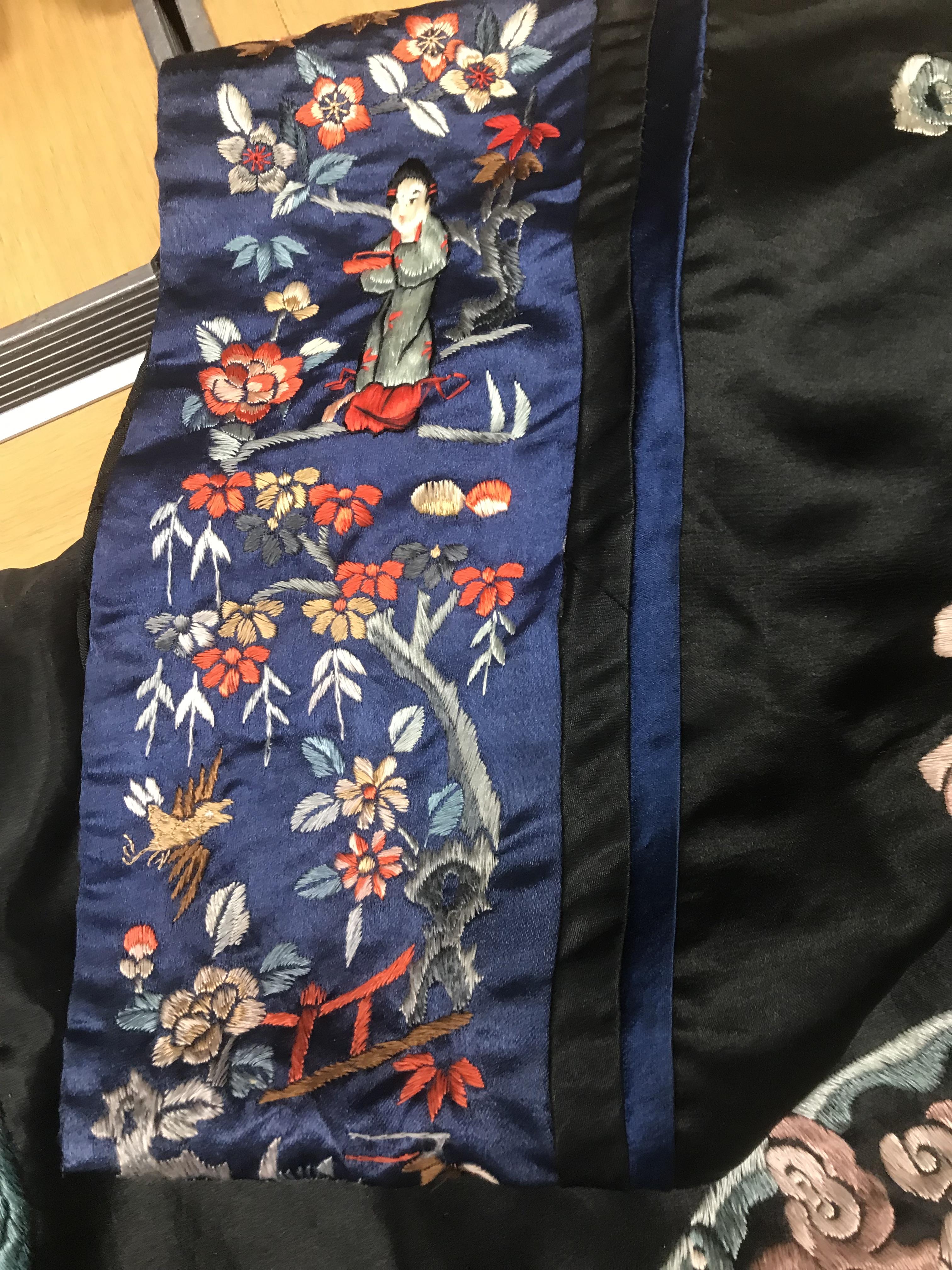 A Chinese silk jacket with crane and wave decoration on a black ground - Image 7 of 8