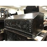 A 18th Century oak Bible box, the plain top above a sloping fall enclosing a single drawer,