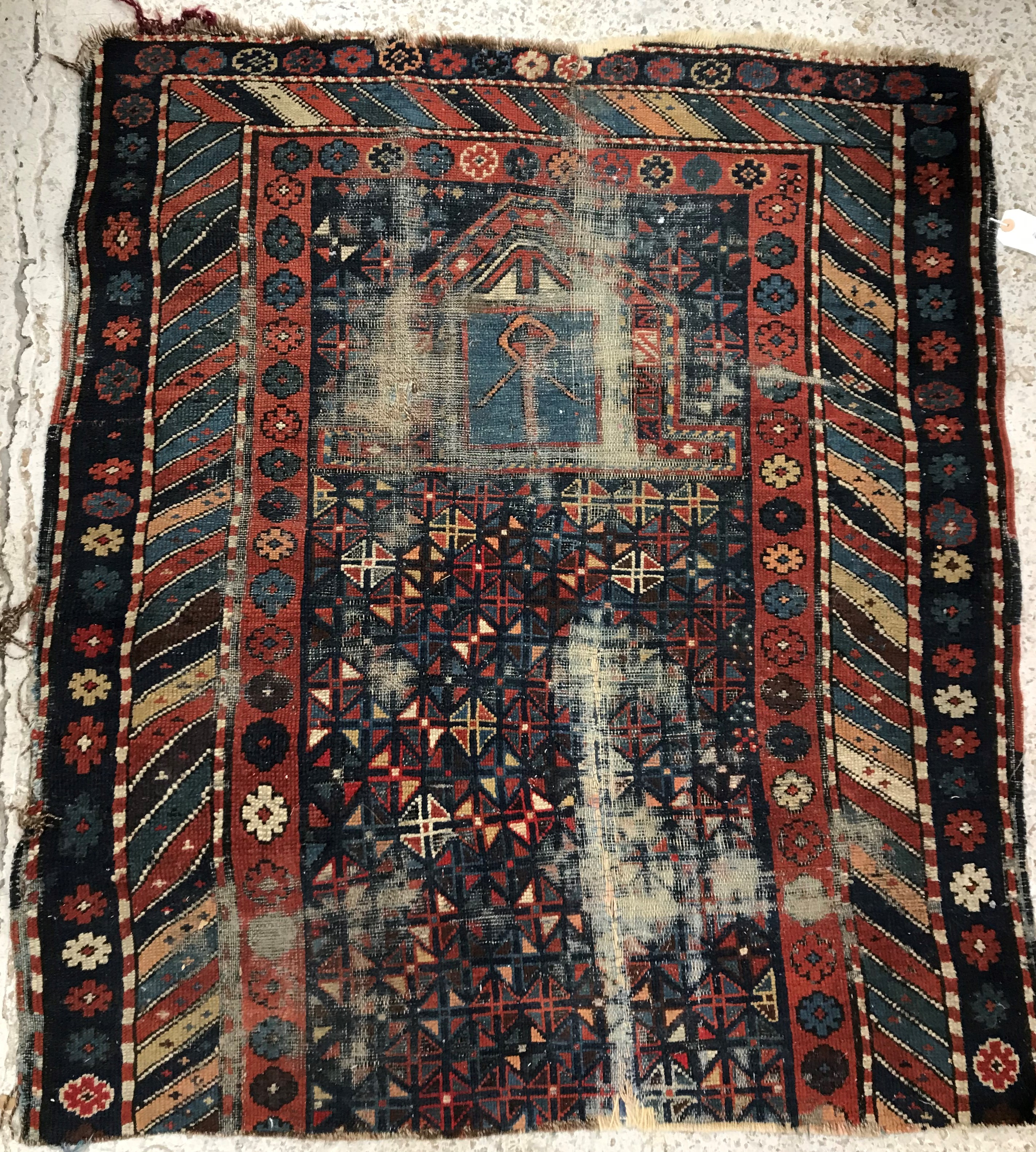 A collection of five rugs comprising a Persian floral decorated rug on purple ground, - Bild 5 aus 5