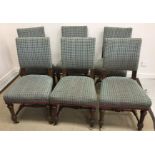 A set of six Victorian oak framed dining chairs with green and white checked upholstery,