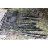A quantity of painted wrought iron railings of plain form, varying sizes,