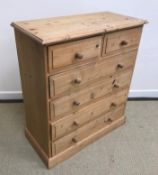 A modern pine chest of two short over four long graduated drawers,