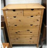A modern pine chest of two short over four long drawers on square supports, 88.
