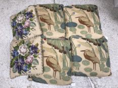 Three boxes of assorted scatter cushions to include two needlework examples,