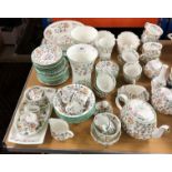 A Minton Haddon Hall part tea and dinner set to include dinner plates, tea cups,