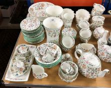 A Minton Haddon Hall part tea and dinner set to include dinner plates, tea cups,