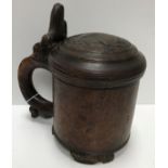 An 18th Century Norwegian burr birch tankard, the thumb piece as a seated lion,