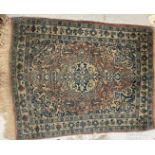 A vintage Kashan rug,