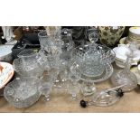 A collection of various cut glass ware including four various jugs, three decanters,