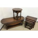 A modern oak nest of three occasional tables in the 17th Century style 55 cm x 35 cm x 47.