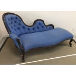 A Victorian mahogany show frame chaise longue in blue self patterned Designers Guild fabric,