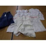 A box of assorted 20th Century childrens' clothes, vintage and other baby's and childrens' clothes,