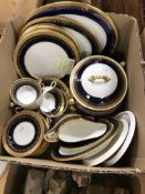 A collection of Aynsley blue and gilt decorated dinner wares in two various patterns,