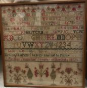 A Victorian needlework sampler with script by Janet May,
