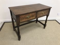 A 20th Century oak two drawer side table in the 18th Century manner,