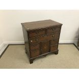 An 18th Century North Country oak and cross-banded chest,